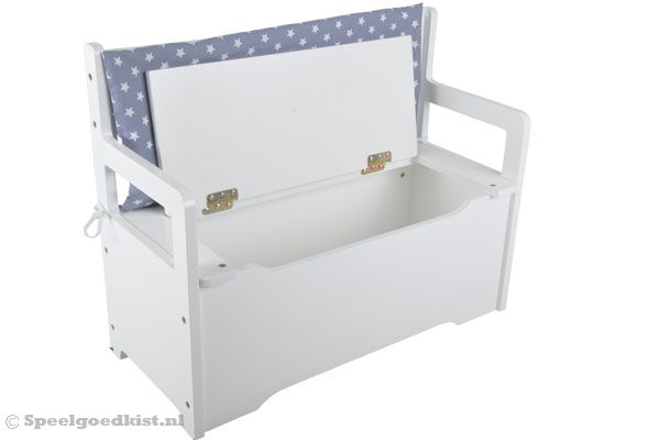 Grijs kussen met witte sterren.