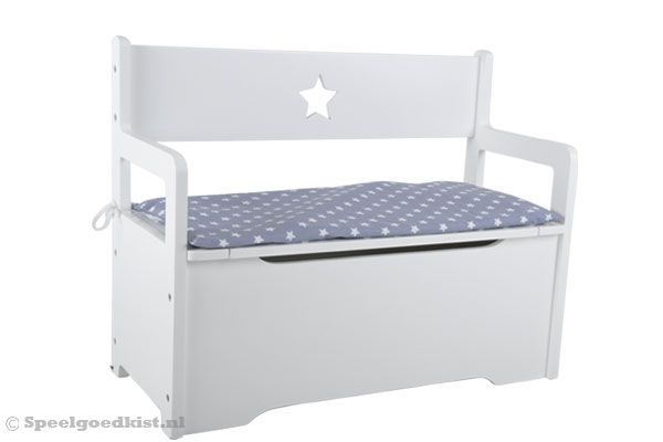 Optioneel: grijs kussen met witte sterren.